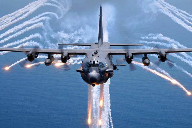 An AC-130H gunship from the 16th Special Operations Squadron jettisons flares as an infrared countermeasure during multi-gunship formation egress training on August 24, 2007. (USAF photo/Julianne Showalter)