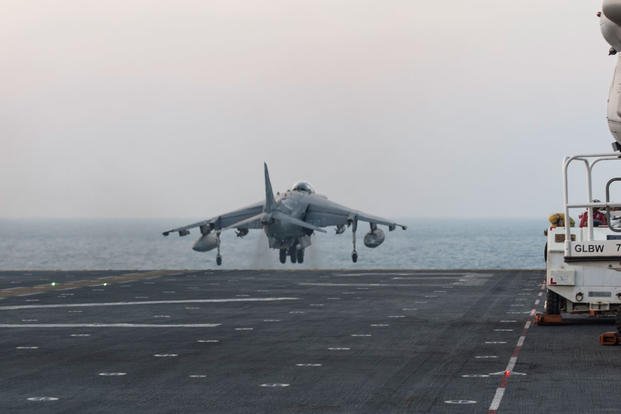 An AV-8B Harrier assigned to Marine Medium Tiltrotor Squadron (VMM) 162 (Reinforced), 26th Marine Expeditionary Unit, launches from the amphibious assault ship USS Kearsarge. Photo by Mass Communication Specialist Seaman Apprentice Ryre Arciaga