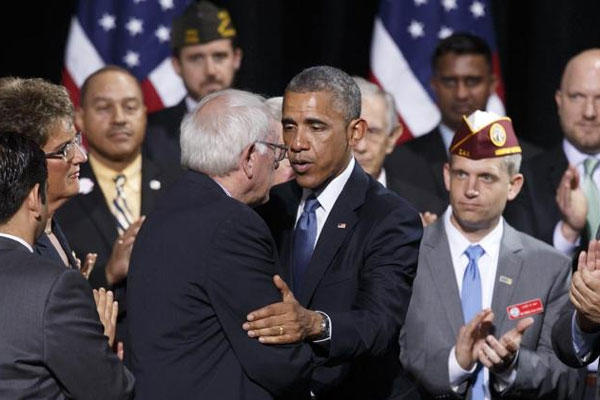 President Obama embraces Sen. Bernie Sanders, I-Vt., as he visits Fort Belvoir, Va., an Army base 20 miles south of Washington, Thursday, Aug. 7, 2014.. (AP Photo/J. Scott Applewhite)
