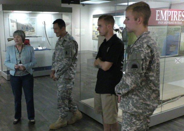 Pfc. (CA) Evan Schneider, a former Make-A-Wish Foundation recipient, his brother, Austin Schneider, and Maj. Gen. K.K. Chinn receive a tour at the Fort Sam Houston Museum in San Antonio, Aug. 7, 2015. (Photo: U.S. Army)
