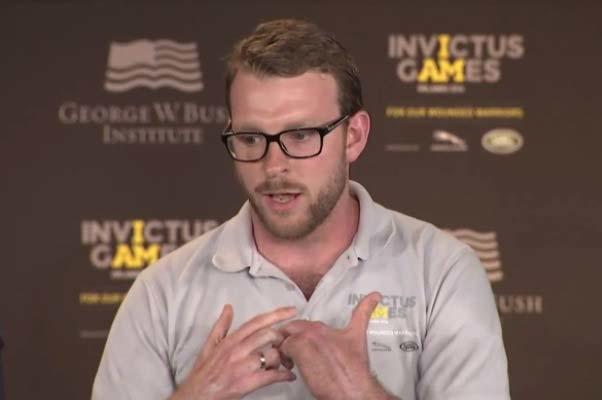 British Royal Marine Reservist Lance Cpl. John James "JJ" Chalmers spoke on a panel with Prince Harry and George W. Bush as part of the Invictus Games on May 8, 2016, in Orlando (Screen grab from video provided by Bush Institute)