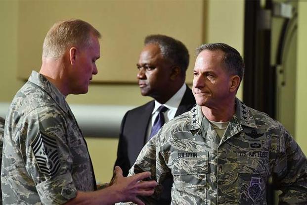 Air Force Chief of Staff Gen. David Goldfein speaks with Chief Master Sgt. of the Air Force James Cody during the Secretary of the Air Force Spouse and Family Forum at Joint Base Andrews, Md., Oct. 19, 2016. (U.S. Air Force photo/Scott M. Ash)