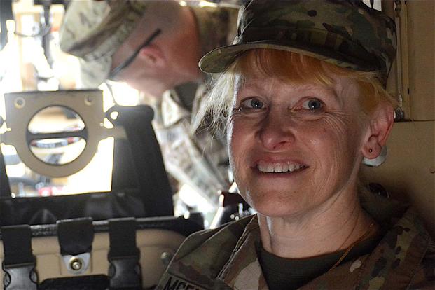 Katrina McFarland sits in a MaxxPro mine-resistant ambush protected (MRAP) vehicle during her visit to the 401st Army Field Support Brigade at Camp Arifjan, Kuwait, May 3. (Army Photo: Justin Graff)