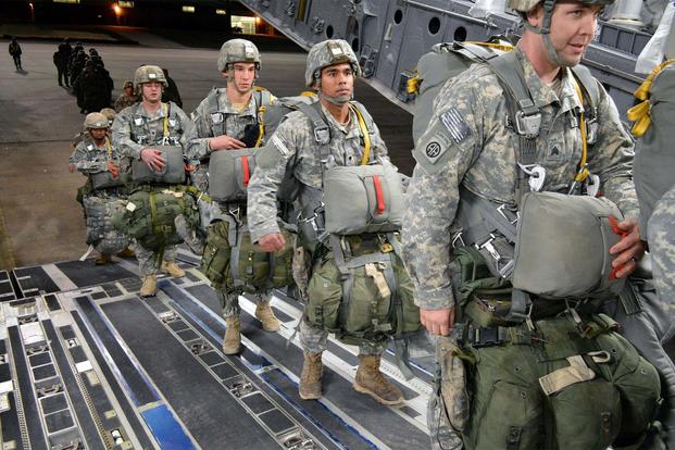 U.S. Army paratroopers from the 2nd Brigade Combat Team, 82nd Airborne Division, load onto a C-17 Globemaster III at Pope Army Airfield, North Carolina, Jan. 27, 2015, (U.S. Air Force photo/Marvin Krause) 