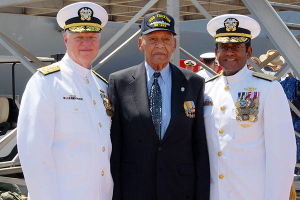 Adm. Gary Roughead and Vice Adm. Melvin Williams Jr. get acquainted with Dr. Lanier Phillips, a survivor of USS Traxtun (DD 229) at the commissioning of the sixth ship to bear that name, USS Truxtun (DDG 103). (U.S. Navy/MC1 Leah Stiles/Released)