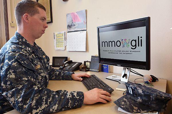 Lt. Daniel Golde, Naval Service Training Command training and readiness officer, checks out a new crowd-sourcing website developed by NSTC and the U.S. Naval Academy to get fleet feedback. (Photo by Scott Thornbloom/U.S. Navy)