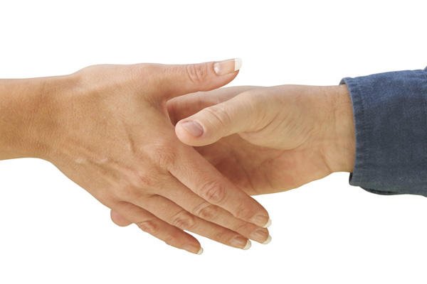 Handshake between a man and a woman.