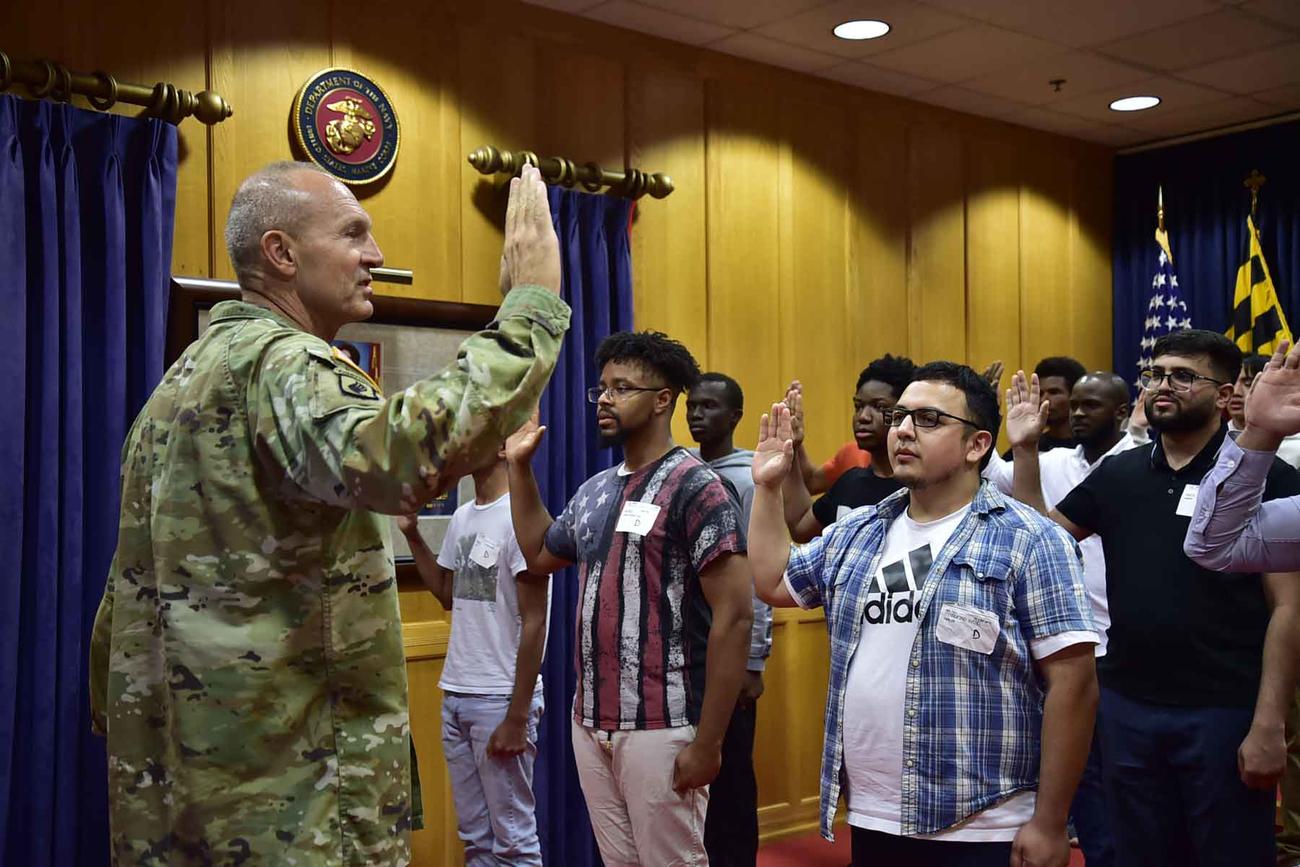 One Recruiting Environment, Two Different for Army and Marine
