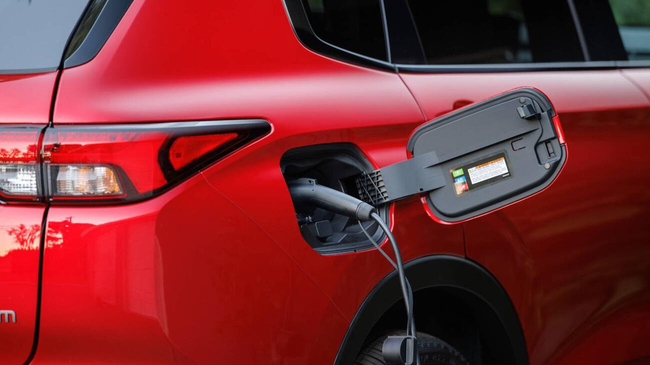 Plug-in hybrid vehicle charging at a public charging station