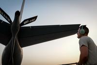 A U.S. Air Force KC-135 Stratotanker maintainer, assigned to the 340th Aircraft Maintenance Unit, inspects the aircraft's boom before a flight in support of Operation Inherent Resolve at Al Udeid Air Base, Qatar, June 7, 2017. (U.S. Air Force/Staff Sgt. Michael Battles)