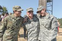 From left, U.S. Army Capt. Kristen Griest, Maj. Lisa Jaster and 1st Lt. Shaye Haver share a moment following Jaster's graduation from Ranger School on Fort Benning, Ga., Oct. 16, 2015. (U.S. Army/Staff Sgt. Alex Manne/ Released)