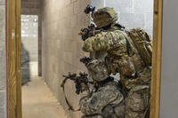 Paratroopers assigned to Alpha Company, 1st Battalion, 508th Parachute Infantry Regiment provide security on a hallway during a nighttime air assault of a notional enemy compound at Fort A.P. Hill, Va., March 20, 2018. (U.S. Army photo/John Lytle)