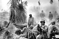 November 1943: U.S. Marines at the Battle of Tarawa in the Gilbert islands. Two Marines killed in that battle, which claimed the lives of 1,696 U.S. service members, were laid to rest on May 5. (US Marine Corps photo)