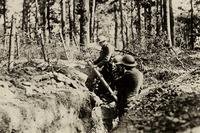 U.S. Army National Guard Soldiers formerly from the 69th Infantry of the New York National Guard fire a Stokes Trench Mortar on enemy positions near Chaussers, France, June 3, 1918. (U.S. Army)