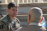 British Army Maj. Gen. Felix Gedney speaks with Iraqi security force Staff Lt. Gen. Wa’ad Zainl Saleh during a High Level Committee lunch in Baghdad, Iraq, Dec. 5, 2017. (US Army/Sgt. Von Marie Donato)