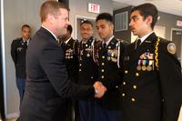 Under Secretary of the Army Ryan McCarthy shakes the hand of JROTC Cadet Gabrile Queslati during an Oct. 30 recruiting trip to Philadelphia. From the far left are Cadet Adam McAvoy, Cadet Jori Lemay, Cadet Aerron McKnight and Cadet Dominic Brown. (US Army photo/Beth Smith)