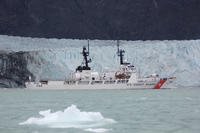 The Coast Guard Cutter Douglas Munro sails past Margerie Glacier in Glacier Bay National Park, Alaska, July 15, 2018. The Douglas Munro crew assisted the Glacier Bay National Park Service personnel in rescuing four people whose kayaks overturned in rough waters, but all four people made it to shore. (Trenton Hirschi, U.S. Coast Guard)