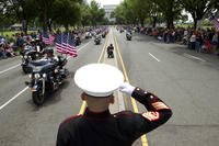 U.S. Marine Tim Chambers salutes to participants in the Rolling Thunder motorcycle rally ahead of Memorial Day on Sunday, May 27, 2018, in Washington. (Jose Luis Magana/AP)
