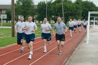 7th WOT Motivation by the MTI assists these seventh week flights to exceed their run times for the final physical training assessment. (U.S. Air Force photo/M.K.Mueller)