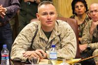 U.S. Marine Corps Col. Norman Cooling speaks at Forward Operating Base, Spin Boldak, Kandahar province, Afghanistan, June 21, 2011. (Sgt. Joseph Johnson/U.S. Marine Corps)