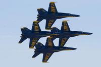 U.S. Navy flight demonstration squadron, the Blue Angels, diamond pilots practice the Diamond 360 maneuver during a practice demonstration at Naval Air Facility (NAF) El Centro, Calif., March 6, 2014. (U.S. Navy/Mass Communication Specialist 1st Class Eric J. Rowley)