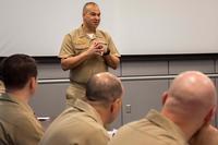 Capt. Theron Toole, Navy Medicine Operational Training Center (NMOTC) commanding officer, speaks at the 2019 NMOTC Leadership Development Symposium. (U.S. Navy/Mass Communication Specialist 2nd Class Michael J. Lieberknecht)