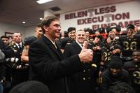 Secretary of the Army, Mark T. Esper, congradulates the West Point football team at the 119th Army-Navy Game in Philadelphia, Pa., Dec. 8, 2018. The Army defeated the Navy for their third year in a row. (U.S. Army/Spc. Dana Clarke)