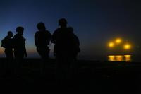 Marines shoot illumination rounds from an M224 60mm mortar system off the flight deck of the amphibious dock landing ship USS Whidbey Island (LSD 41), Nov. 21, 2016 (U.S. Marine Corps/Cpl. Chris Garcia)