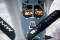 A U.S. Air Force B-1B Lancer is refueled by a KC-135 Stratotanker.