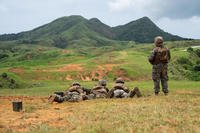 Marines fire M240B medium machine guns at Camp Hansen