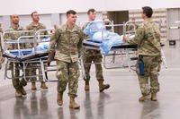 Texas Army National Guard troops set up a field hospital in Dallas. 