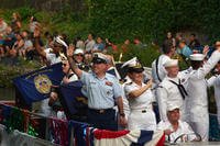 boat sailing in a parade