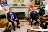 President Donald Trump meets with Iraqi Prime Minister Mustafa al-Kadhimi in the White House.