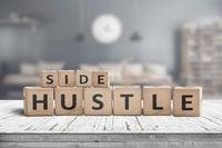 Wooden play blocks spelling out words &quot;Side Hustle&quot;