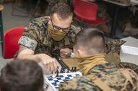 U.S. Marines play a game of chess.