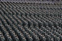 New South Korean military officers salute during the joint commission ceremony.