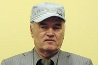 former Bosnian Serb Gen. Ratko Mladic sits in the courtroom.