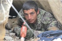 An Afghan soldier goes through training.