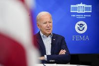 President Joe Biden listens during a FEMA briefing in the Eisenhower Executive Office Building.