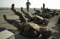 Marines perform flutter kicks.