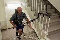 Wing commander runs up flight of stairs during the Sept. 11 Tower Run.