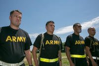 Soldiers listen to instructions before a physical fitness test.