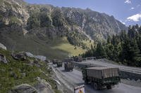 Indian army convoy moves on the Srinagar- Ladakh highway at Gagangeer