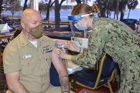 U.S. Navy sailor gets a COVID-19 vaccine at Naval Submarine Base Kings Bay