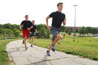 Poolees run a hill circuit.