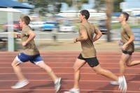 Midshipmen take part in a 1.5-mile run.