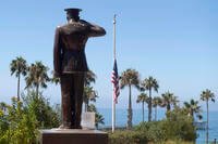 U.S. flag is seen lowered to half-staff at Park Semper Fi in San Clemente