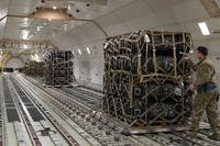 Palletized ammunition, weapons and other equipment bound for Ukraine