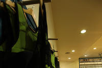 Weighted vests and sandbags line the walls at a gym at Camp Lejeune.