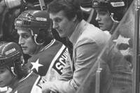 USA coach Herb Brooks, center, looks on from the bench during the closing minutes of the semifinal game against the U.S.S.R at the 1980 Winter Olympic Games in Lake Placid, N.Y.